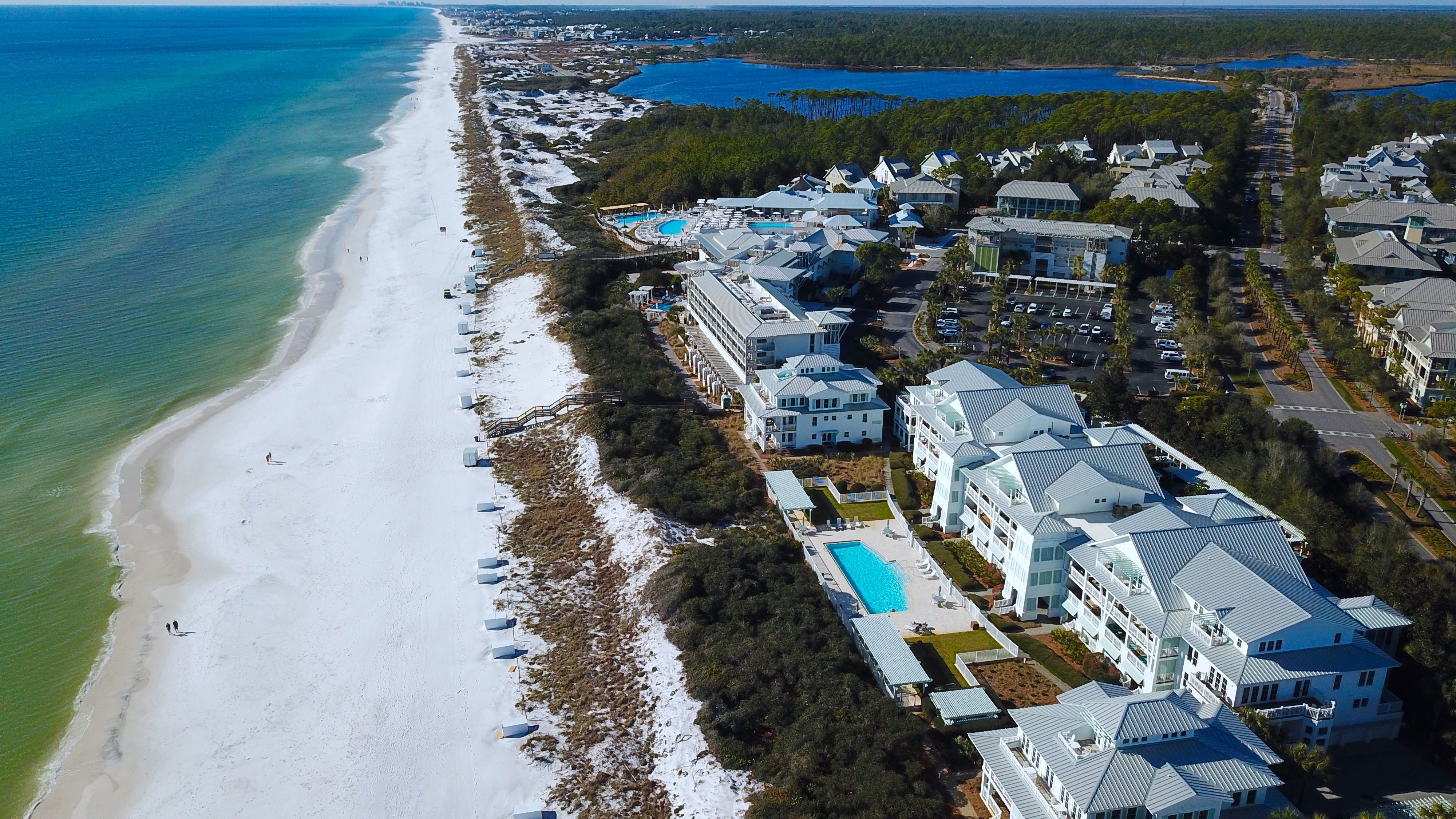 An aerial view of Watercolor along gulf shore featuring the gulf front condos